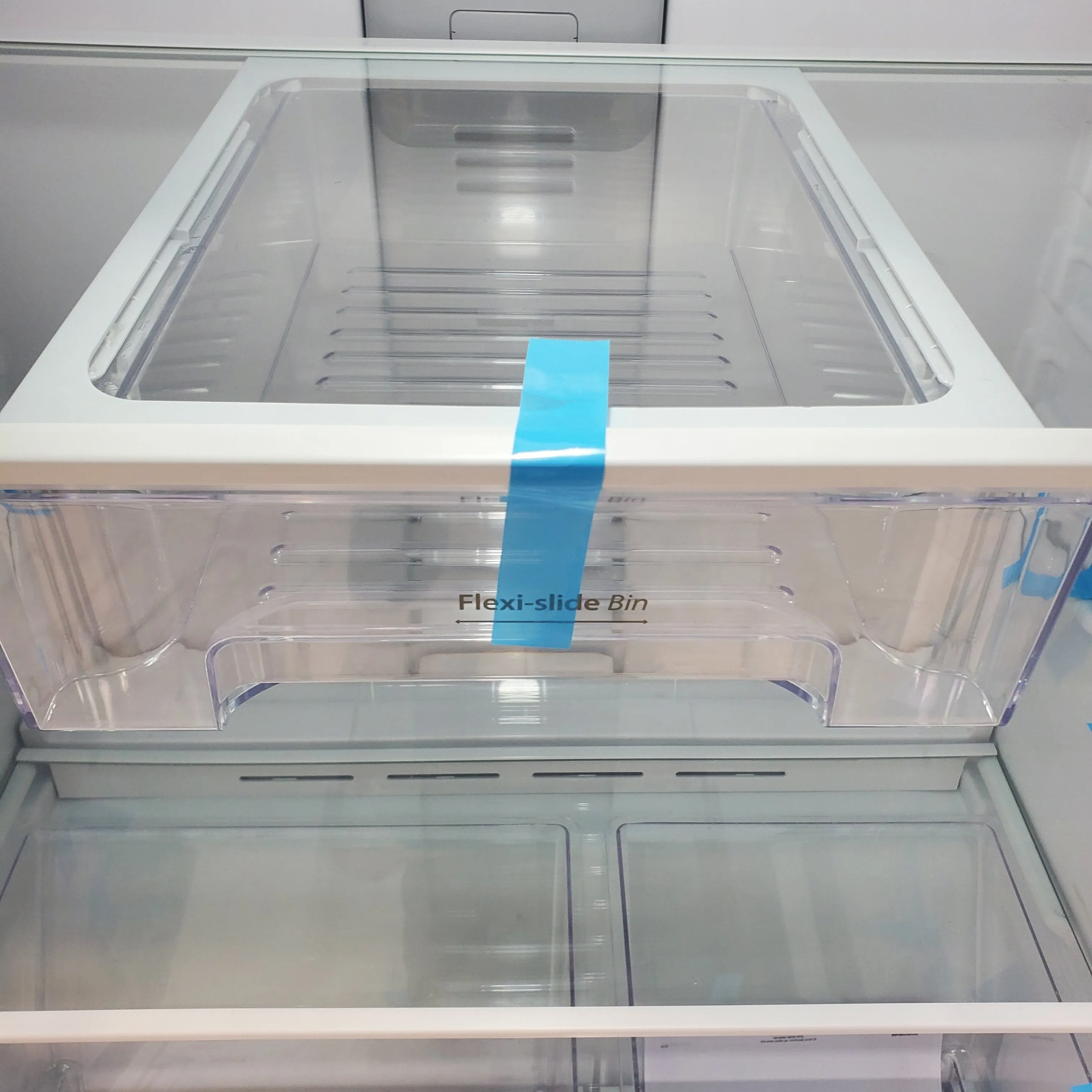 33" Wide Fingerprint-Resistant Stainless Steel Whirlpool 20.5 cu. ft. Top Freezer Refrigerator with Flexi-Slide Bin - Scratch & Dent - Minor