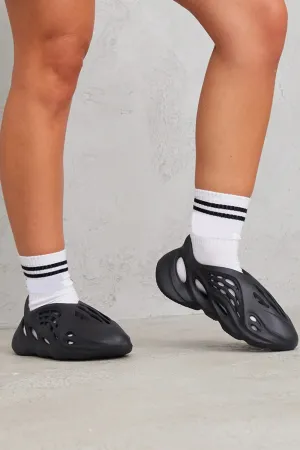 Black Slip On Rubber Trainer With Cutout Detail