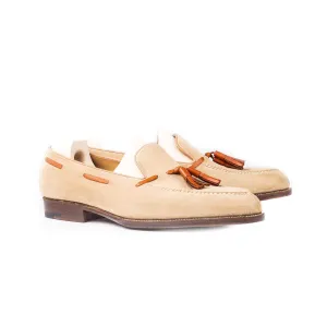 Loafer with hand stitched apron and tassels