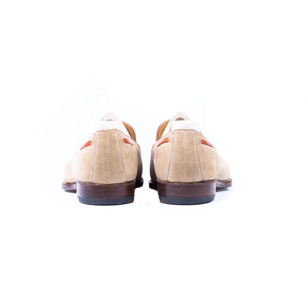 Loafer with hand stitched apron and tassels