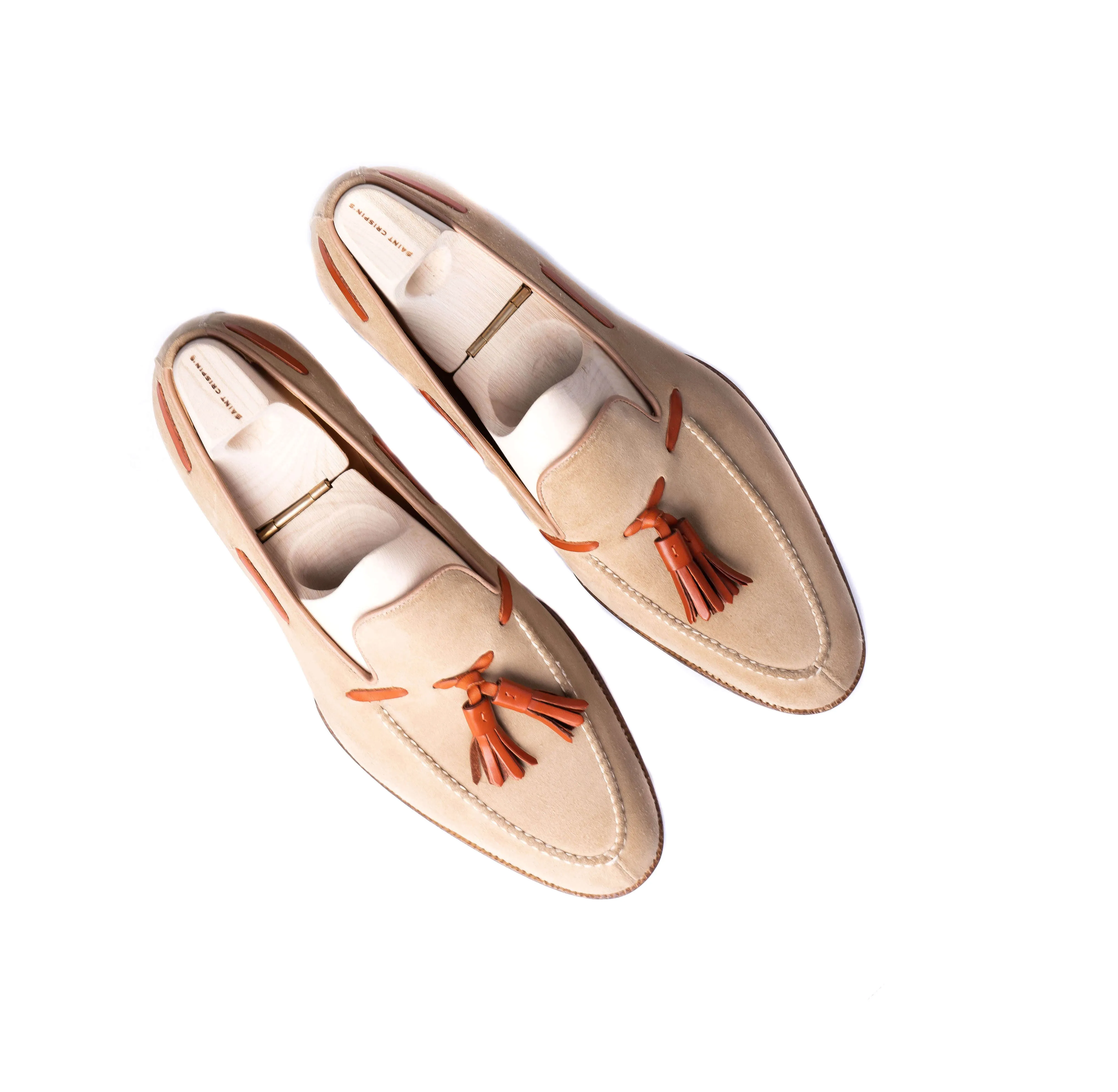 Loafer with hand stitched apron and tassels